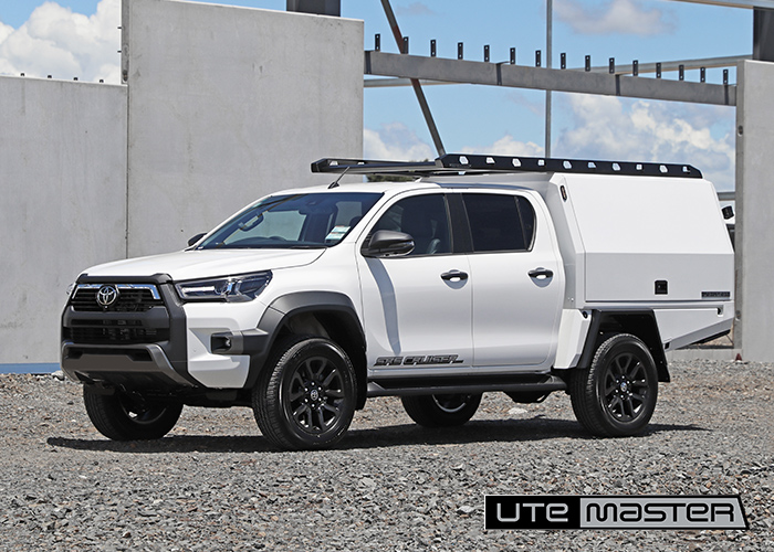 Toyota Hilux white TrailCOre Service Body cantilever roof racks