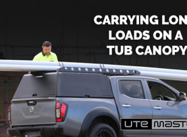 Carrying long loads on a ute canopy